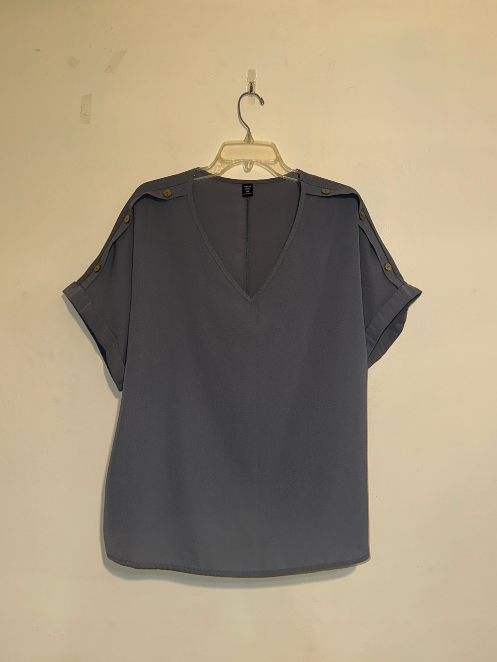 Dusty blue blouse with button detail